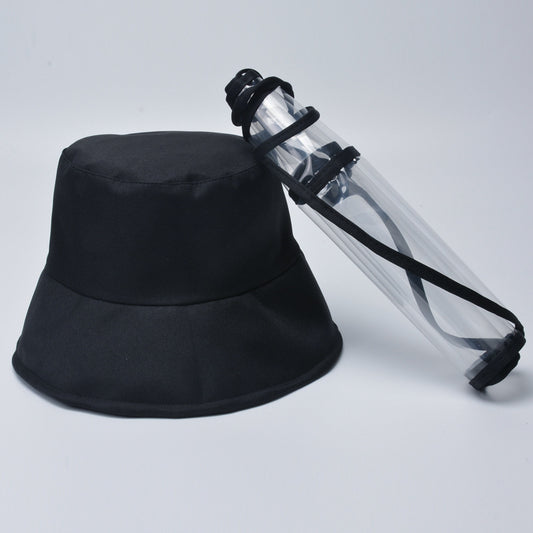 Wearing a transparent face mask and fisherman's hat